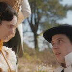 Tanya Reynolds (left) as "Mrs. Elton" and Josh O'Connor (left) as "Mr. Elton" in director Autumn de Wilde's EMMA., a Focus Features release. Credit : Focus Features