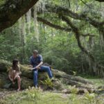 Kya (Daisy Edgar-Jones) and Tate Walker (Taylor John Smith) in Columbia Pictures' WHERE THE CRAWDADS SING.