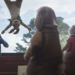 Peter Rabbit (James Corden), Benjamin (Colin Moody), Mopsy (Elizabeth Debicki), Flopsy (Margot Robbie) watch Cottontail (Aimee Horne) having some fun in Columbia Pictures' PETER RABBIT™ 2: THE RUNAWY.